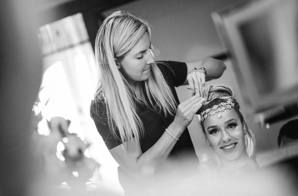 Bride having professional hairstyling and getting ready for her elopement in Paris at the Peninsula Paris Bride having professional hairstyling and getting ready for her elopement in Paris at the Peninsula Paris