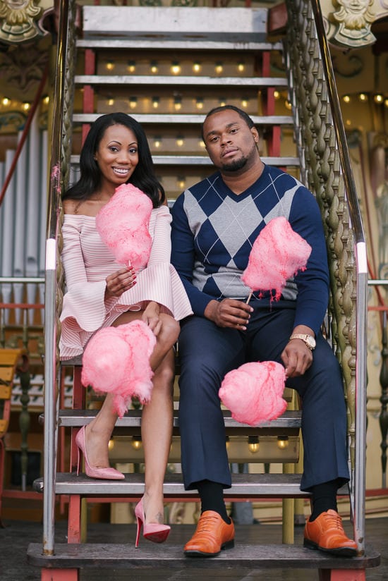 Cute black couple fun photo with cotton candy in Paris Cute black couple fun photo with cotton candy in Paris