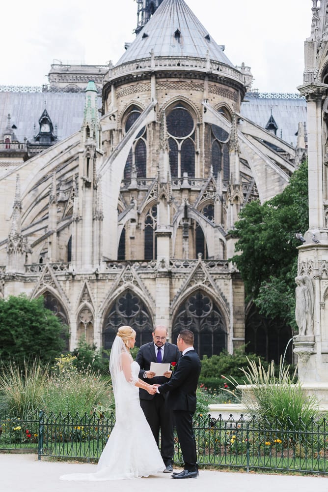 Elopement in Paris behind the Notre Dame Cathedral in Square Jean XXIII Elopement in Paris behind the Notre Dame Cathedral in Square Jean XXIII