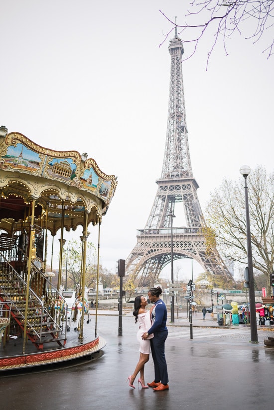 Kissing in the street near the Carousel of the Eiffel Tower Kissing in the street near the Carousel of the Eiffel Tower